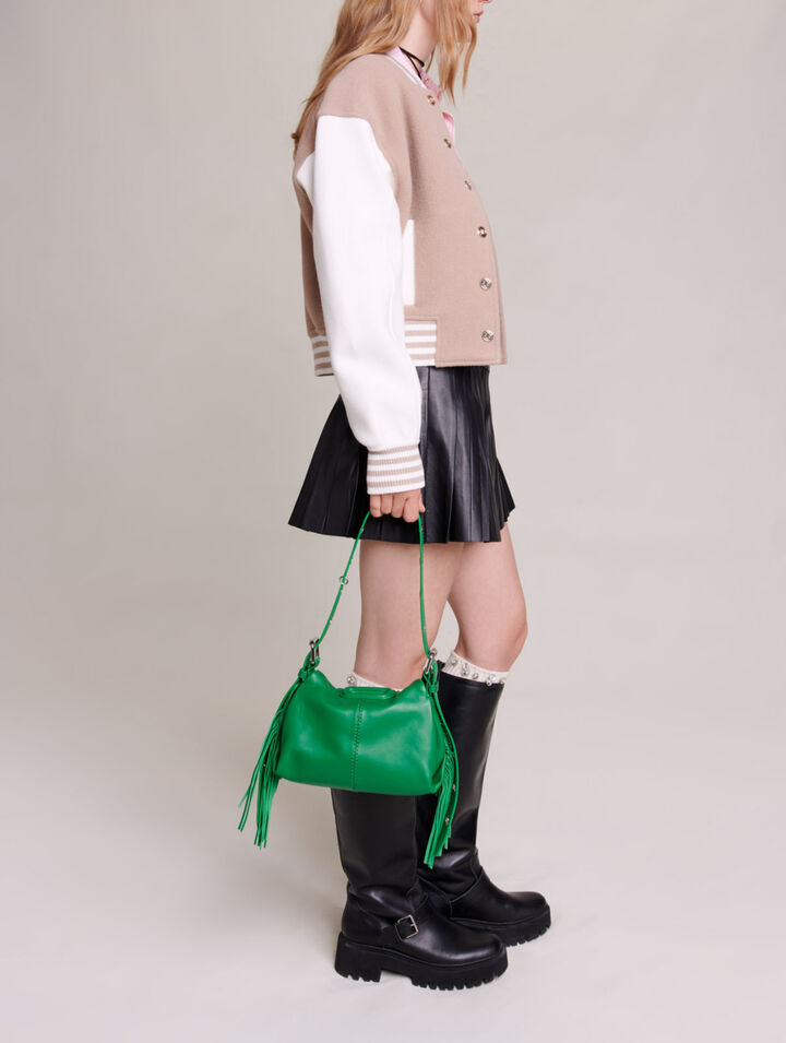 Pleated, flared leather skirt