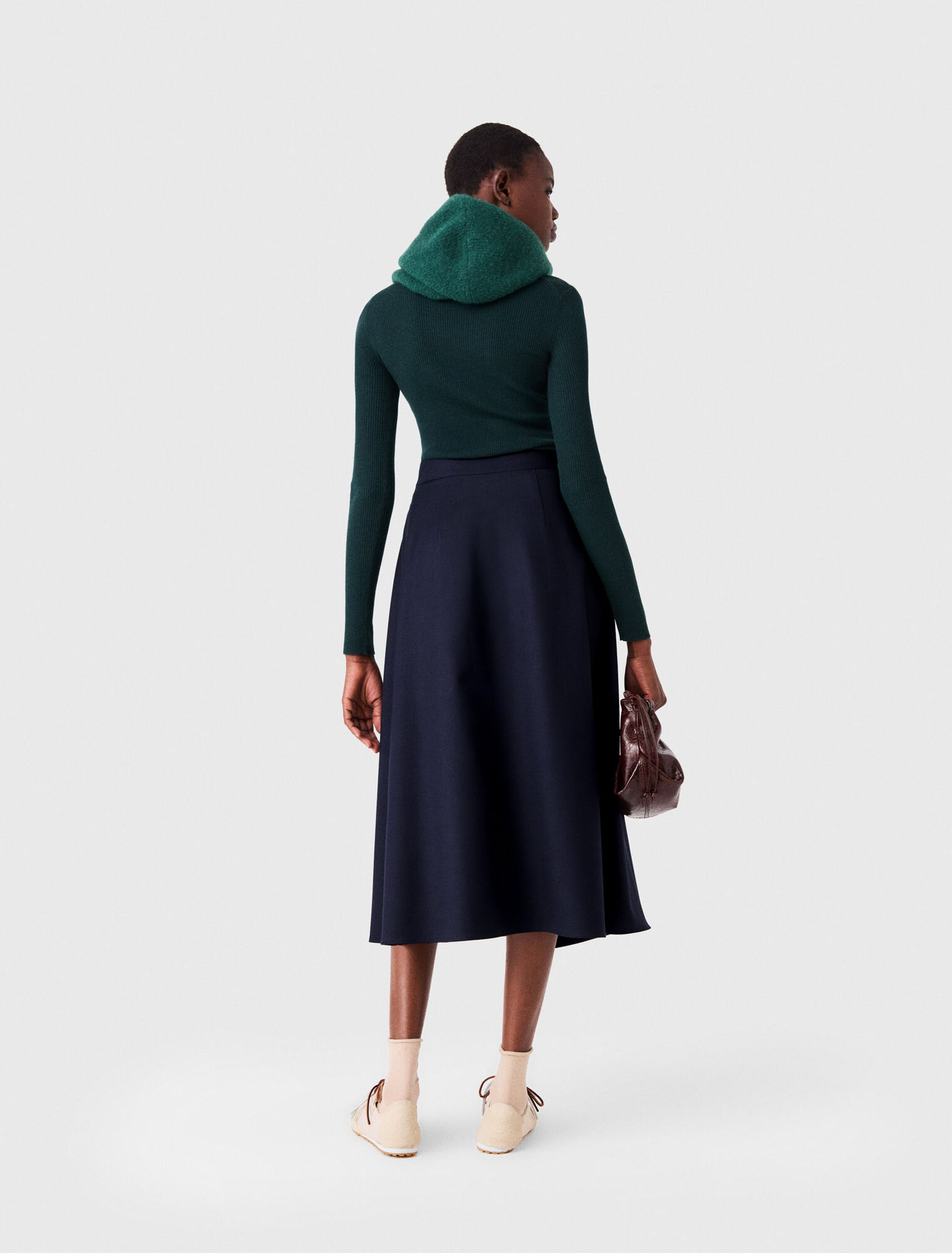 Long pleated skirt with buckle