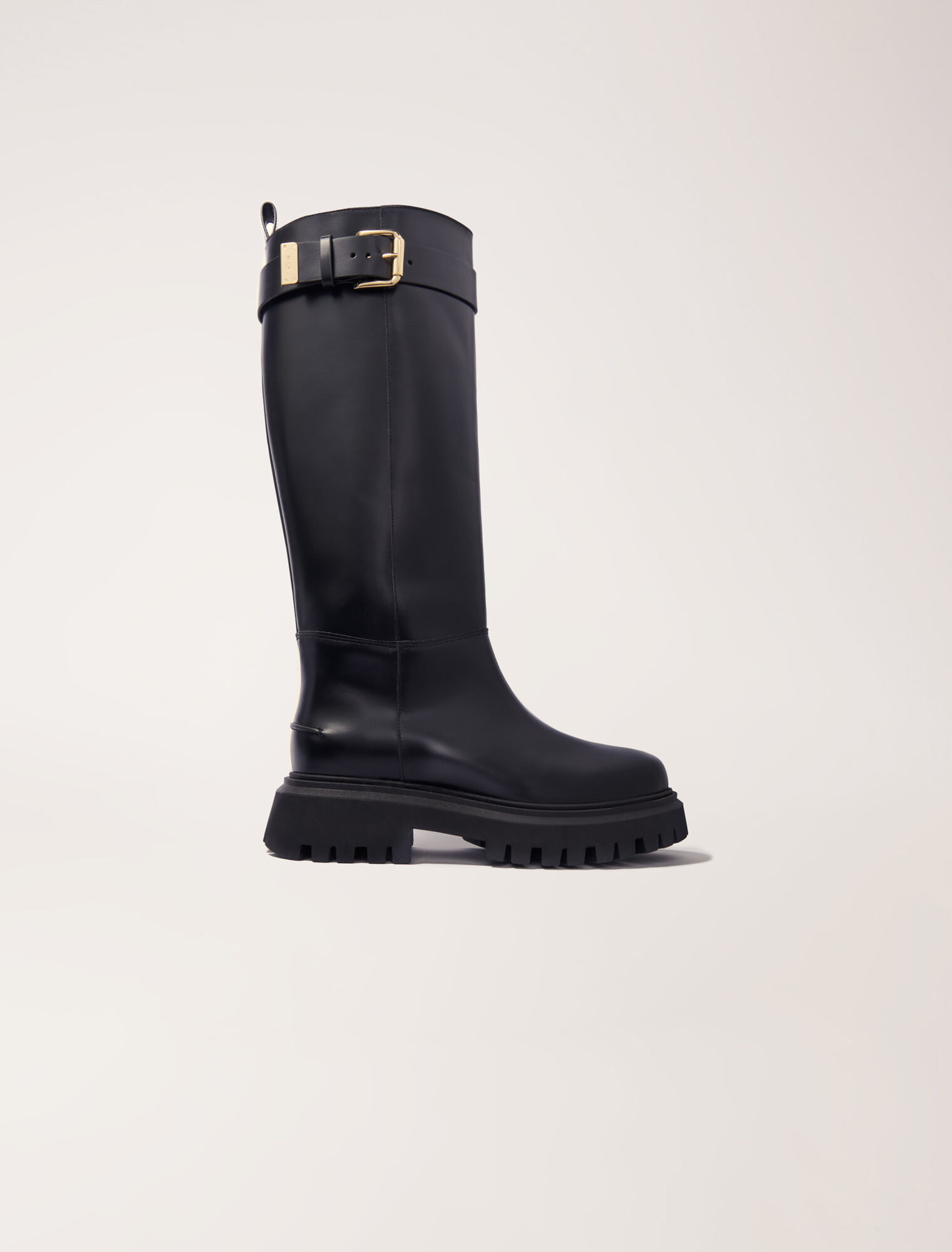 Buckled leather boots