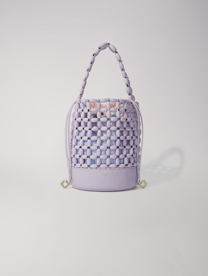 Bucket bag embellished with beads