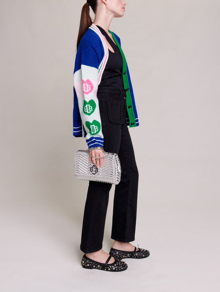 Black jeans, braided finishes on pockets