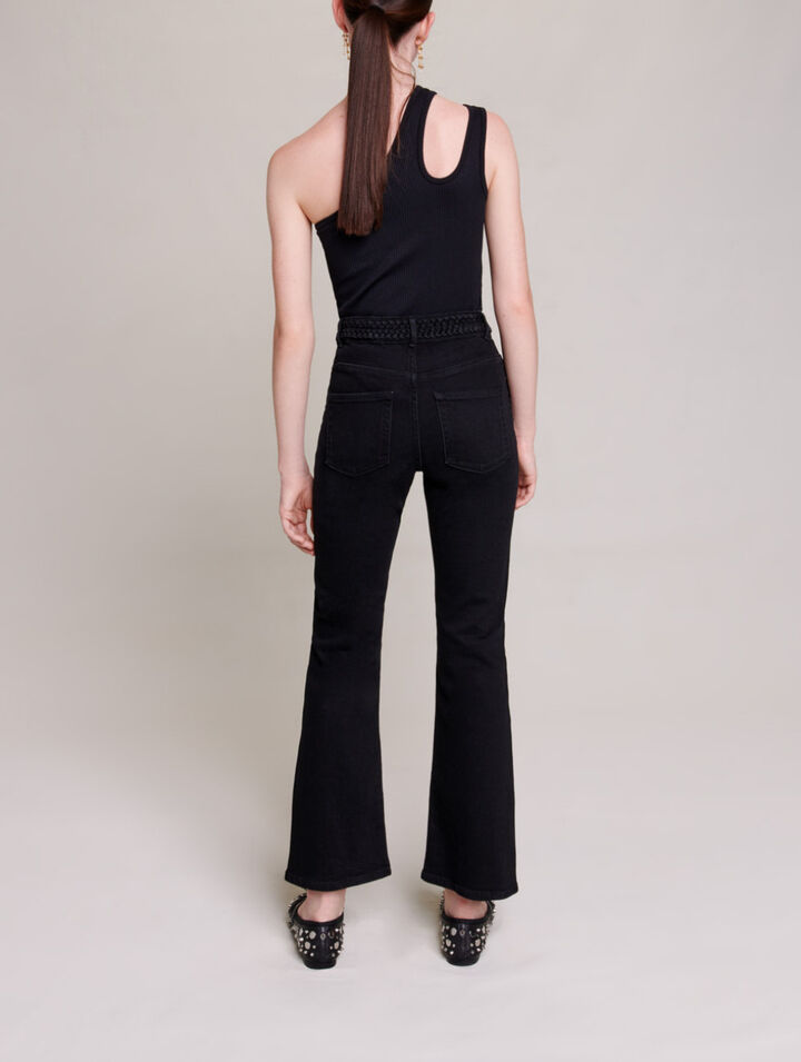 Black jeans, braided finishes on pockets