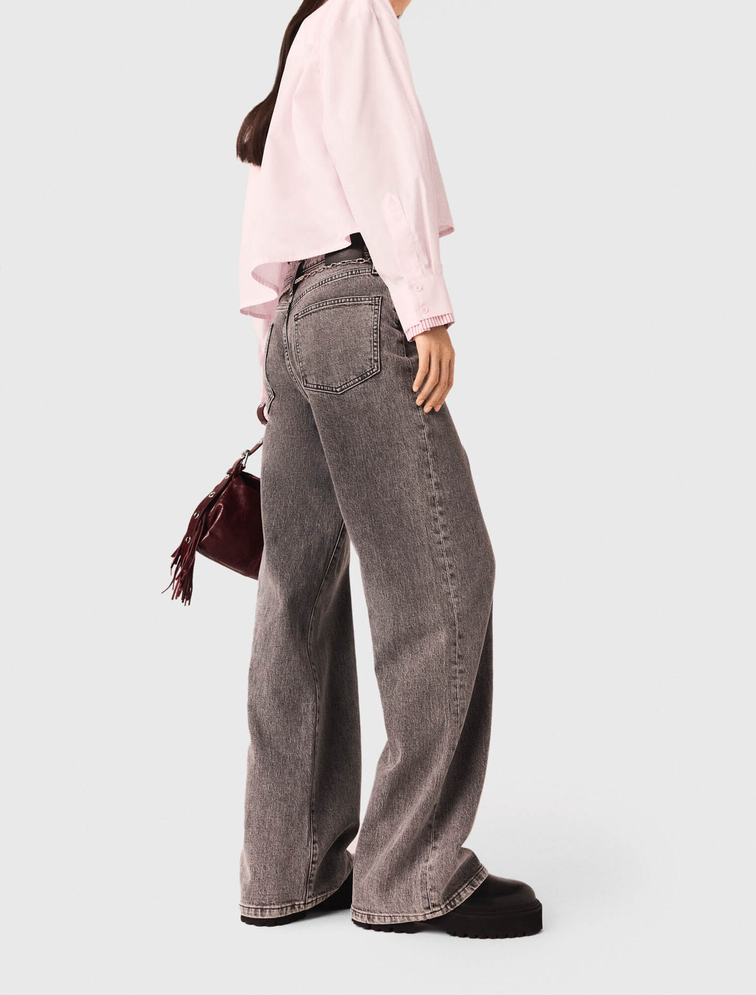 Wide-leg jeans with chain-link belt