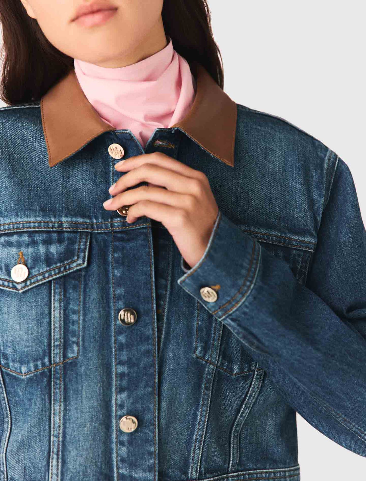 Denim jacket with leather collar