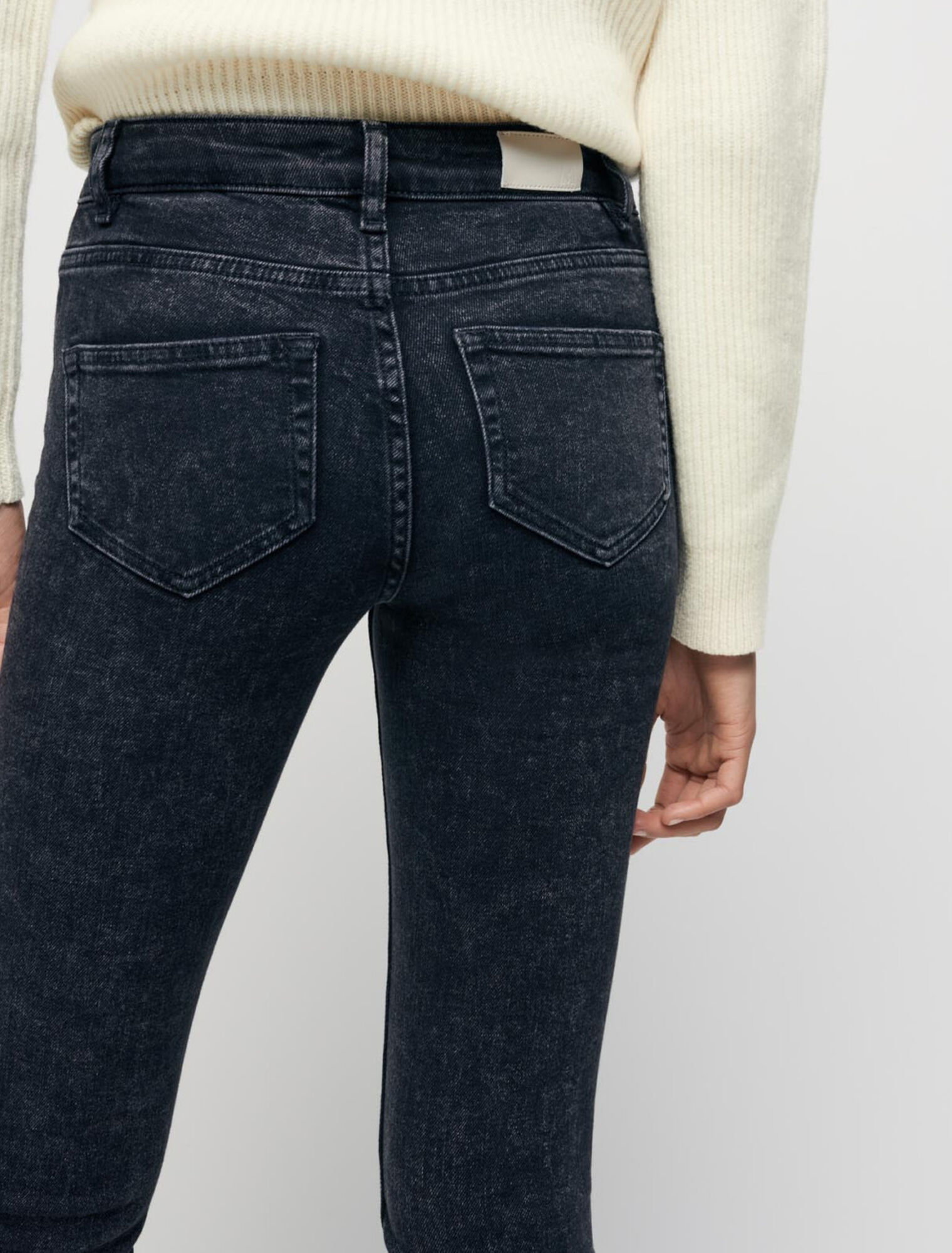 Straight jeans with ripped hems