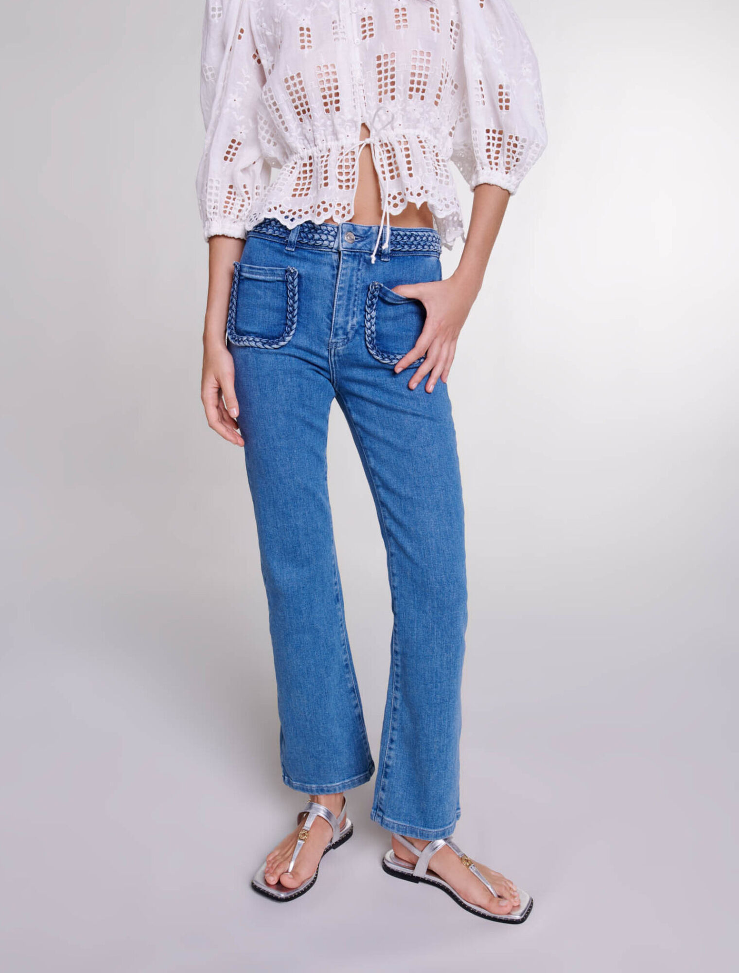 Jeans con detalles trenzados