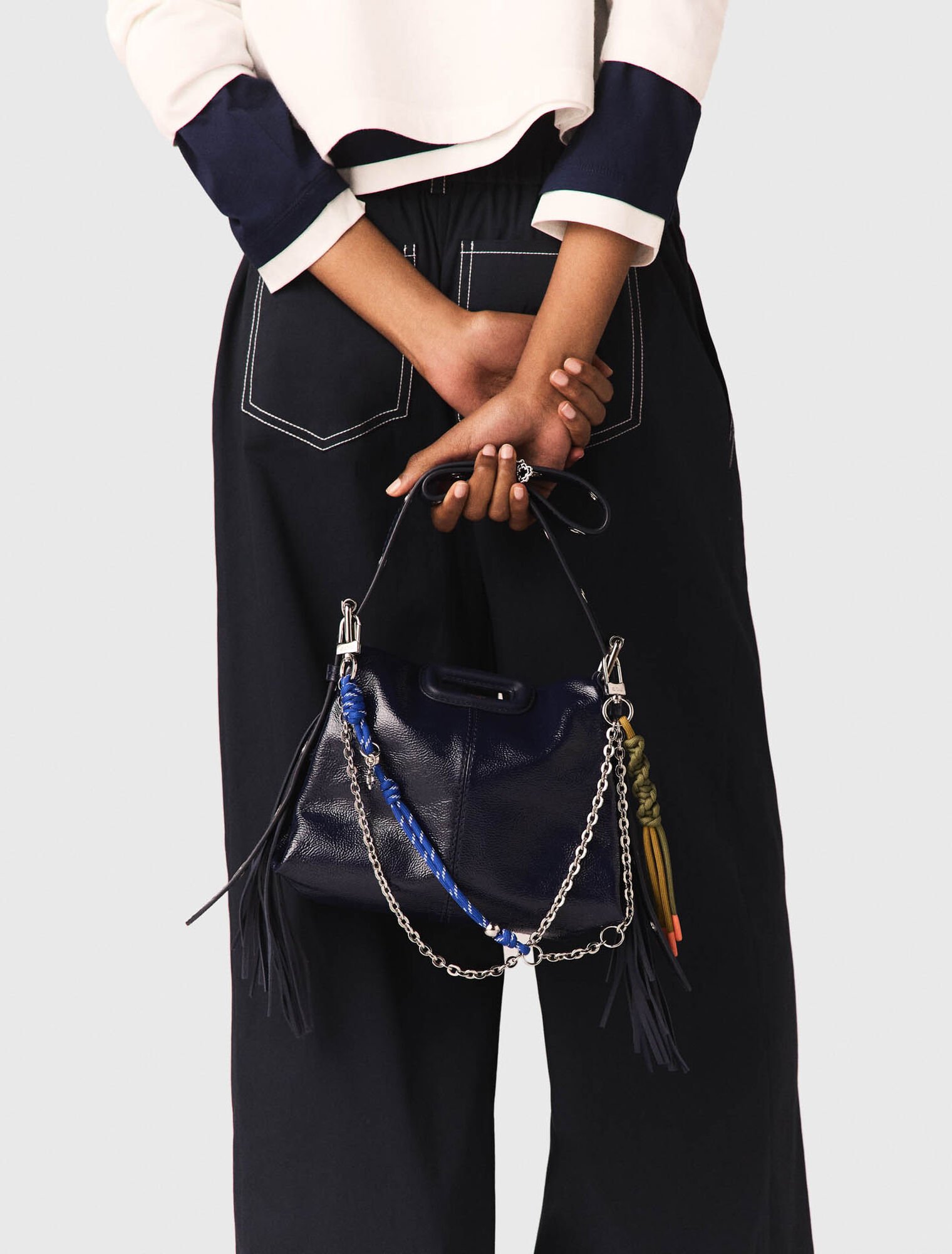 Cotton trousers with leather belt