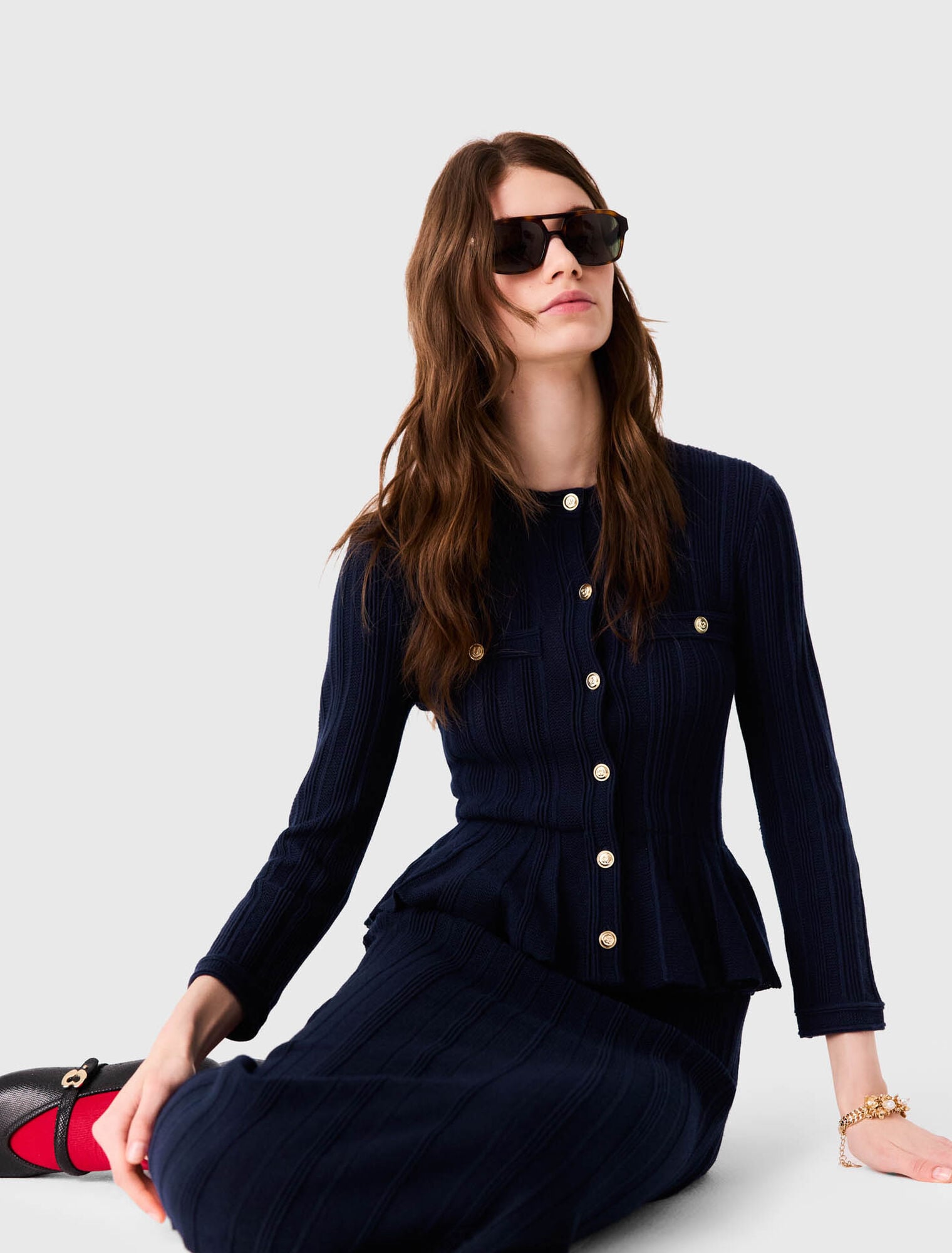 Knit dress with peplum waist