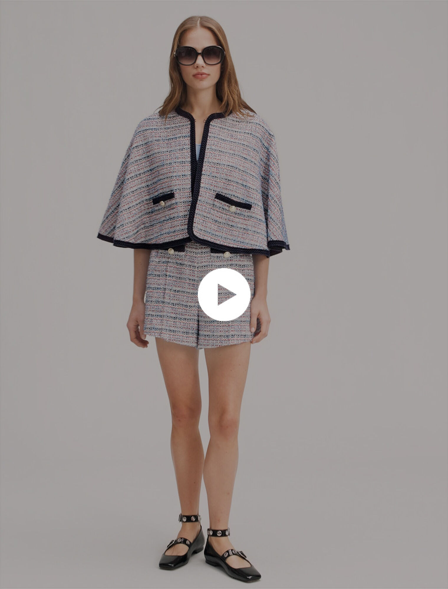 Tweed cape with contrasting trim