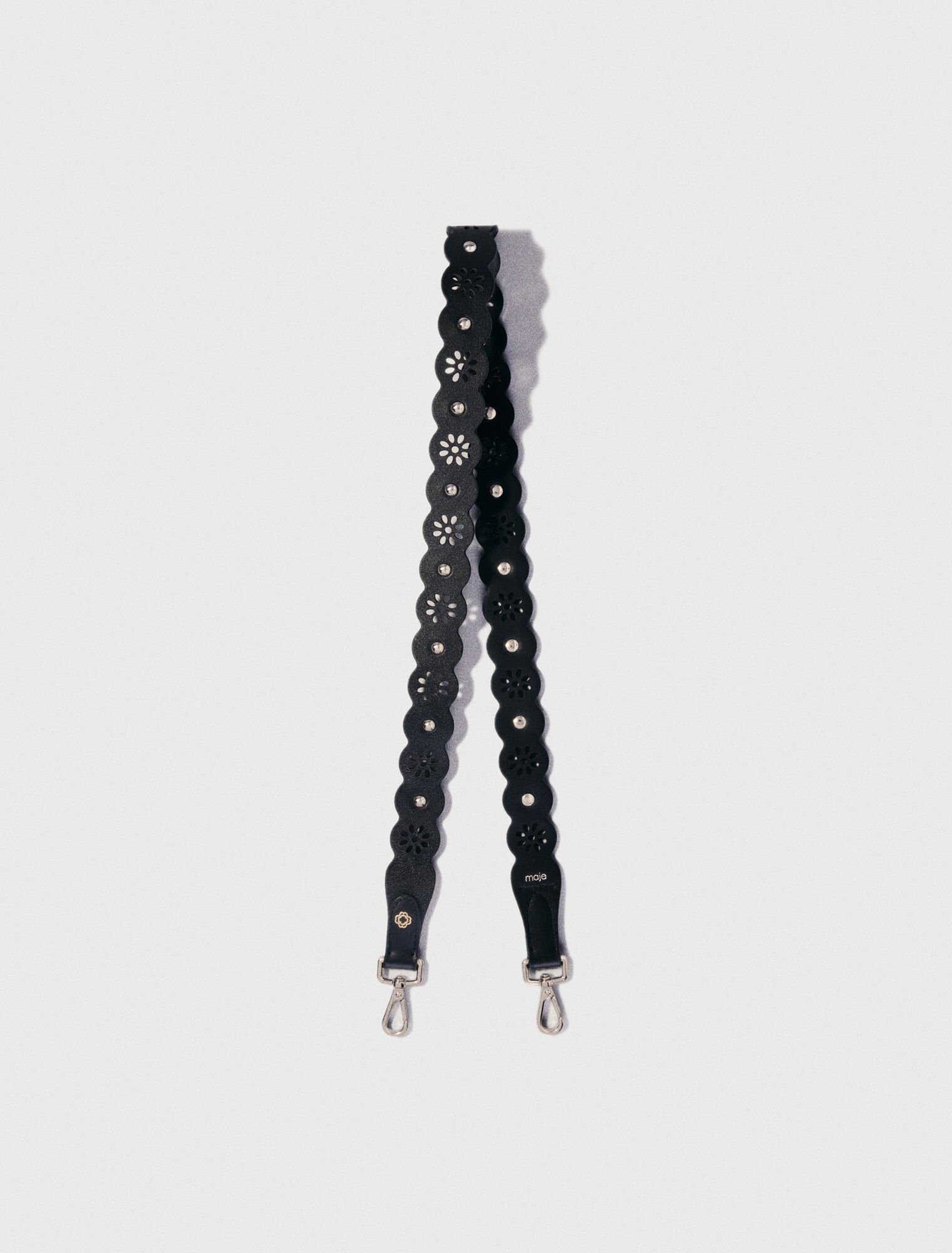 Perforated flower-style strap
