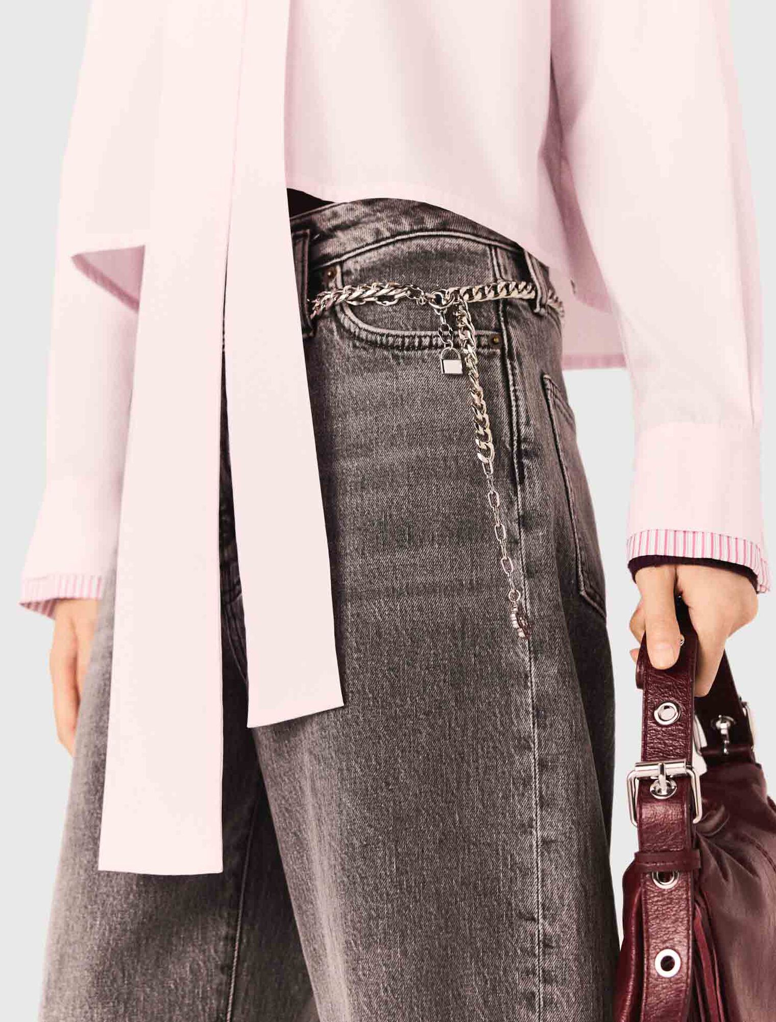 Wide-leg jeans with chain-link belt