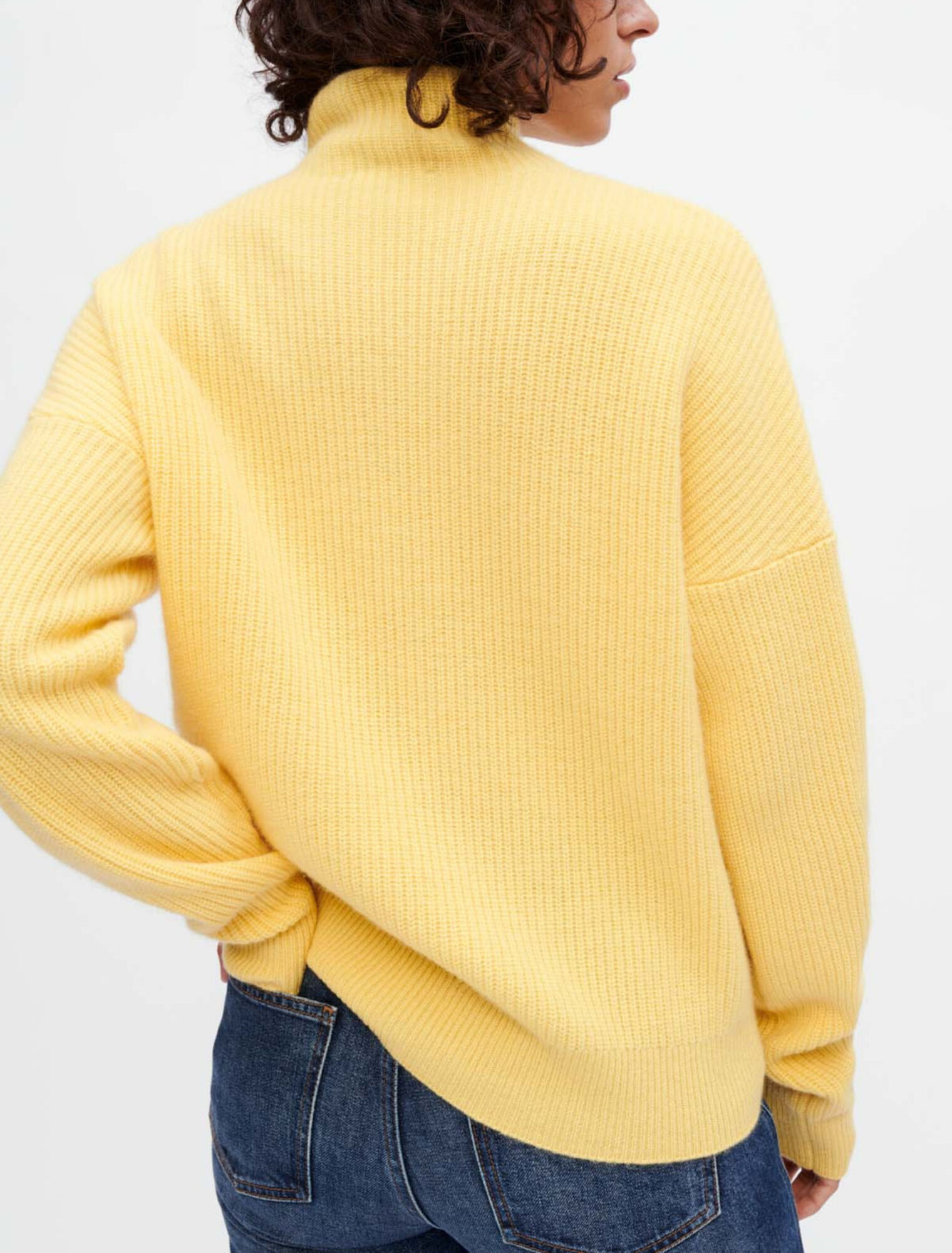 Cashmere sweater with gold press studs