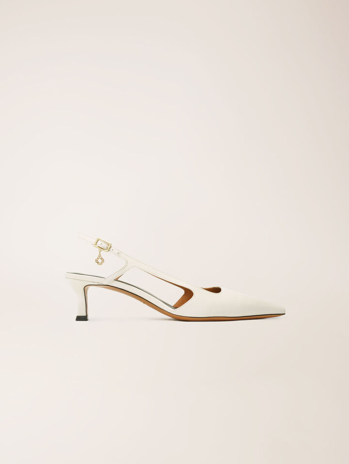 Pointed-toe pumps with straps