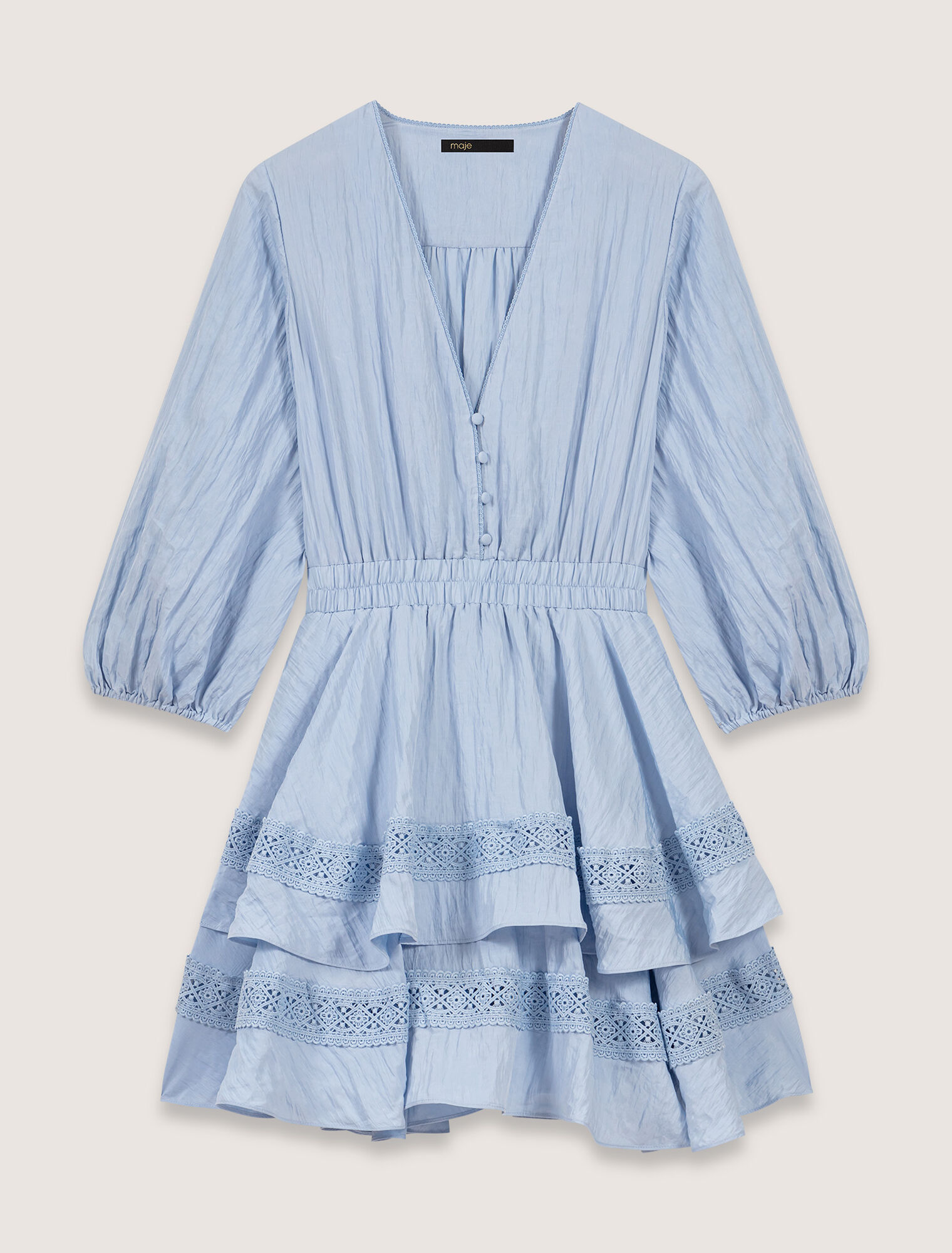Dress with ruffles and lace details