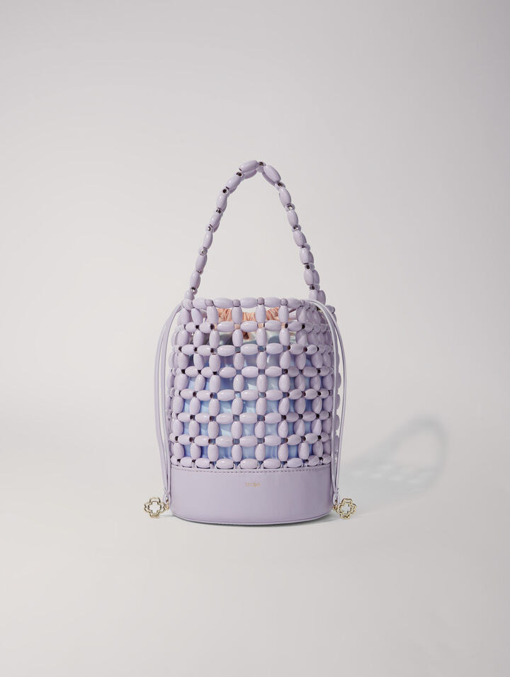 Bucket bag embellished with beads