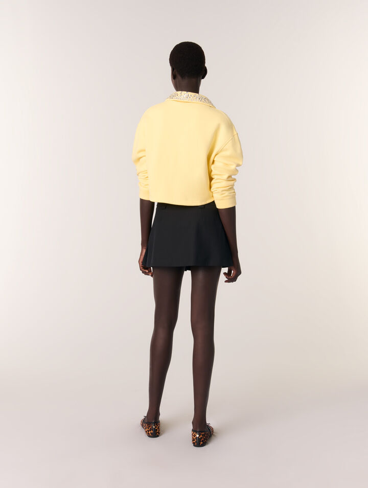Short pleated skirt