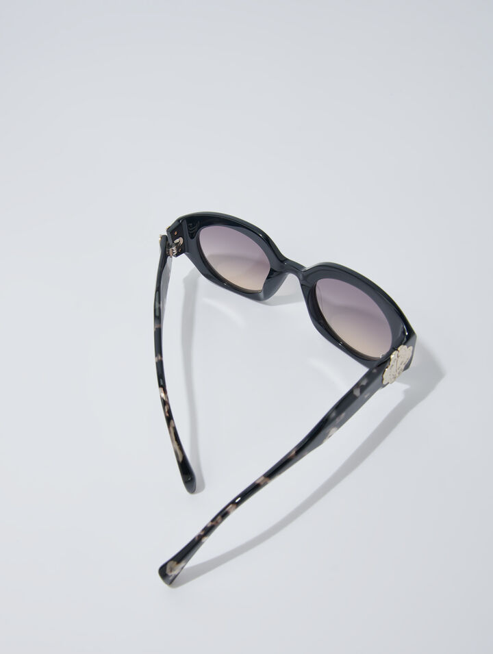 Round acetate glasses