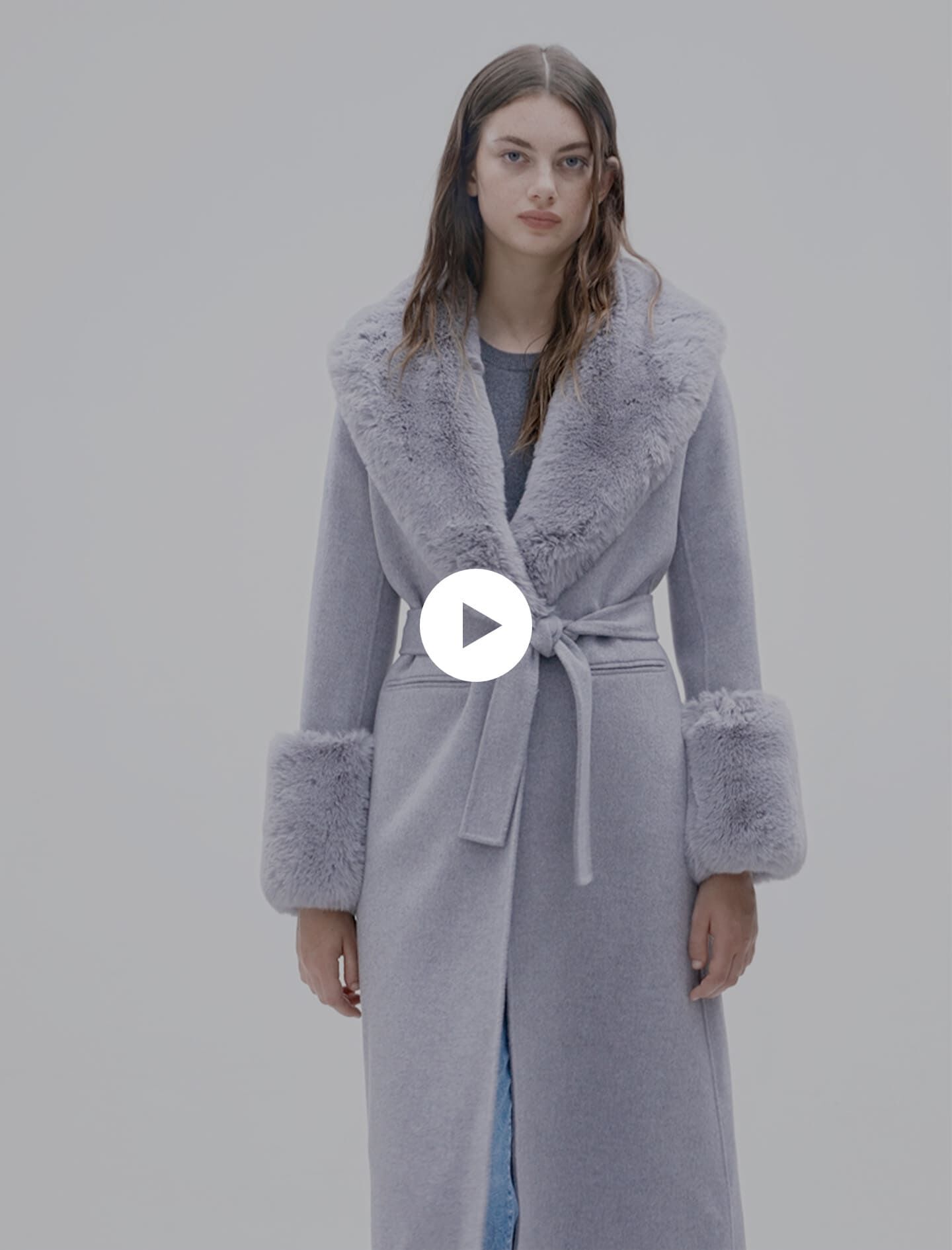Coats with fur around the collar top