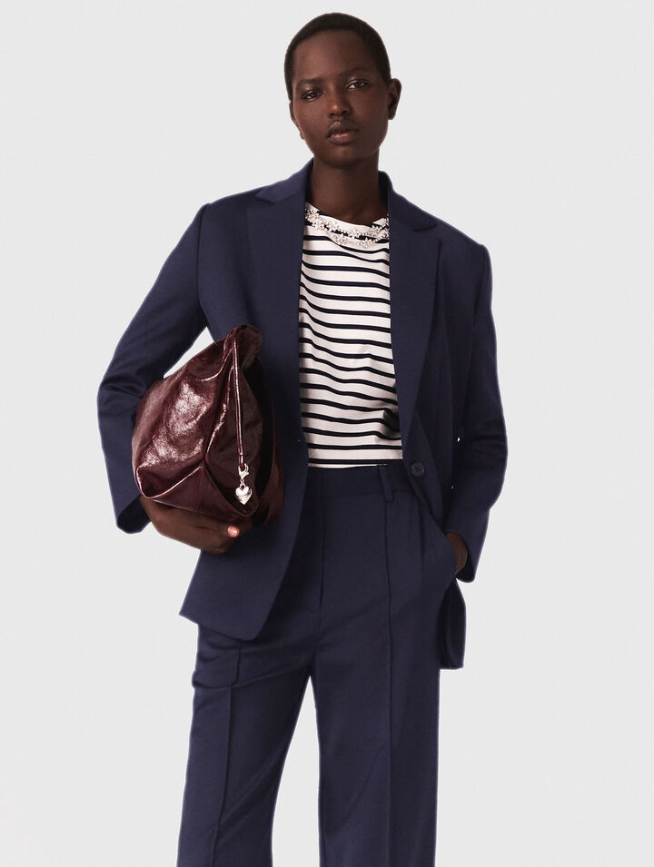 Suit jacket with pleated back