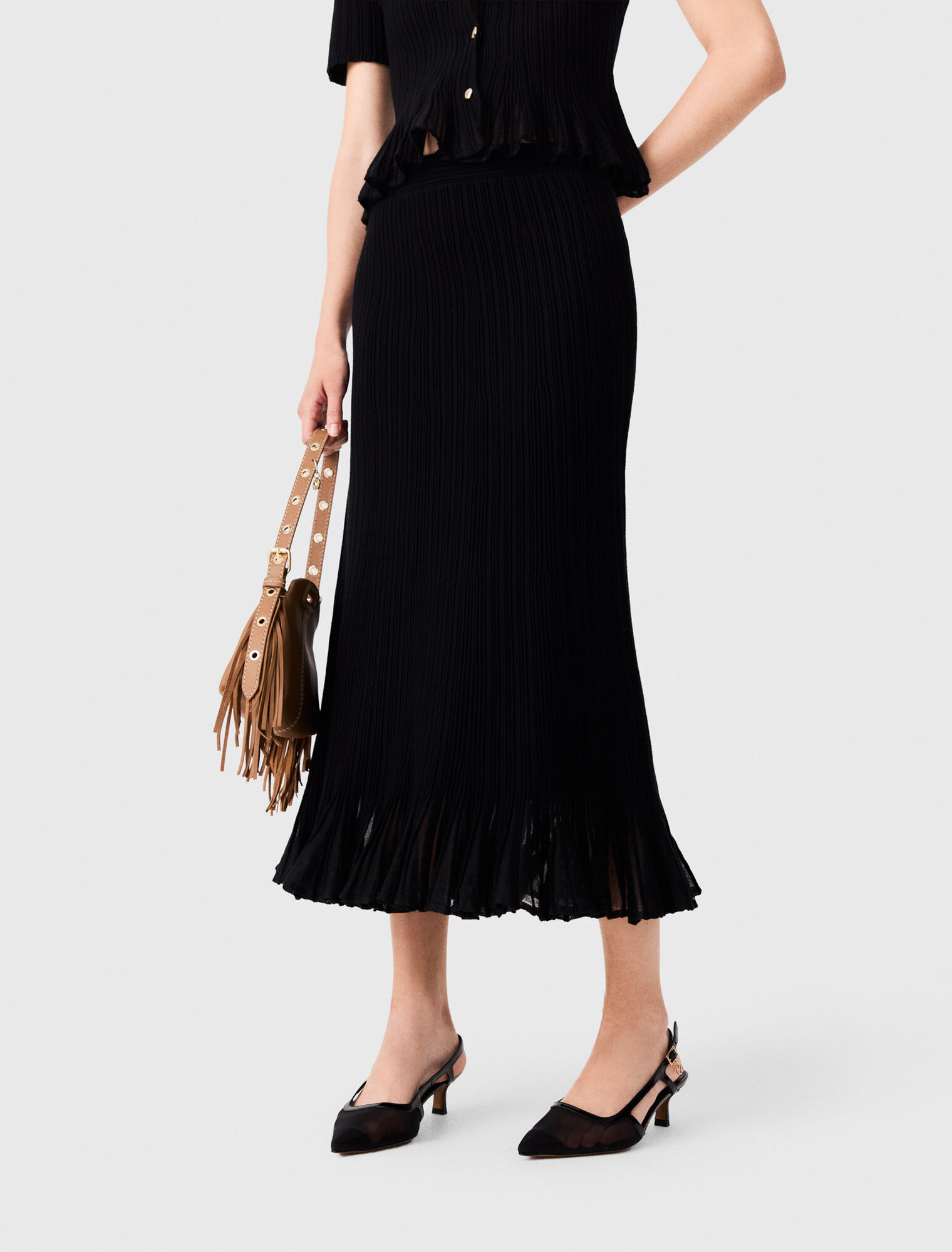 Knit skirt with peplum hem