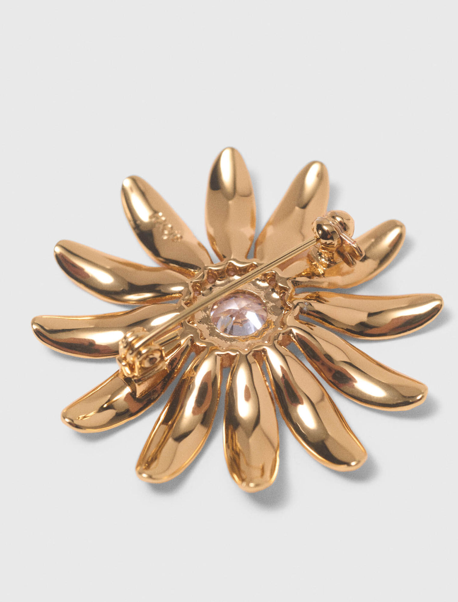 Gold rhinestone flower brooch