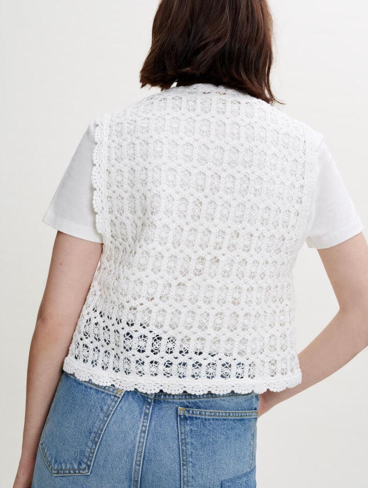 Small sleeveless jacket in guipure