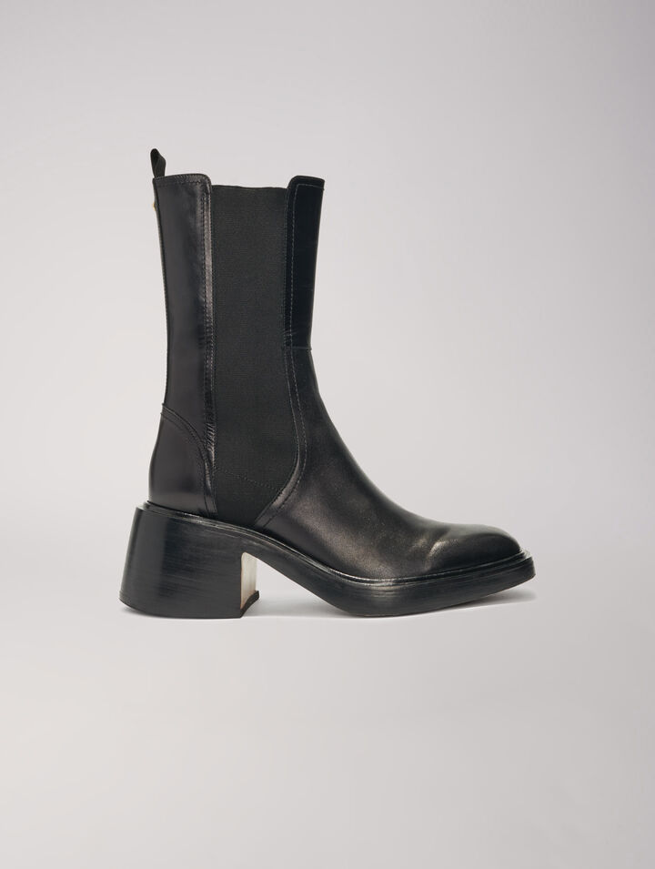 Black leather ankle boots and square toe