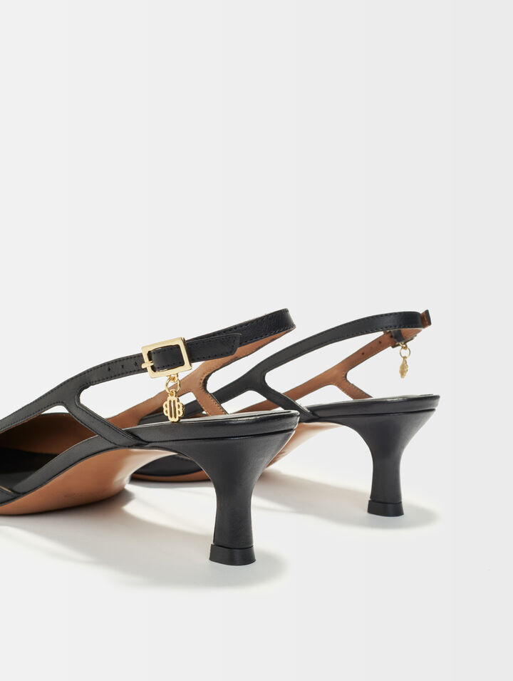 Pointed-toe pumps with straps