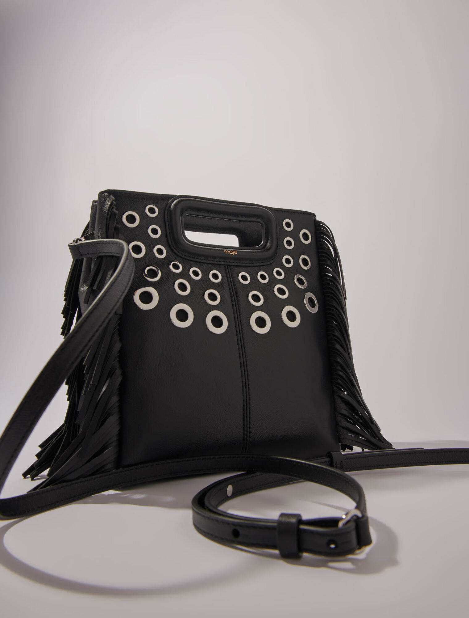 Leather M bag with eyelets