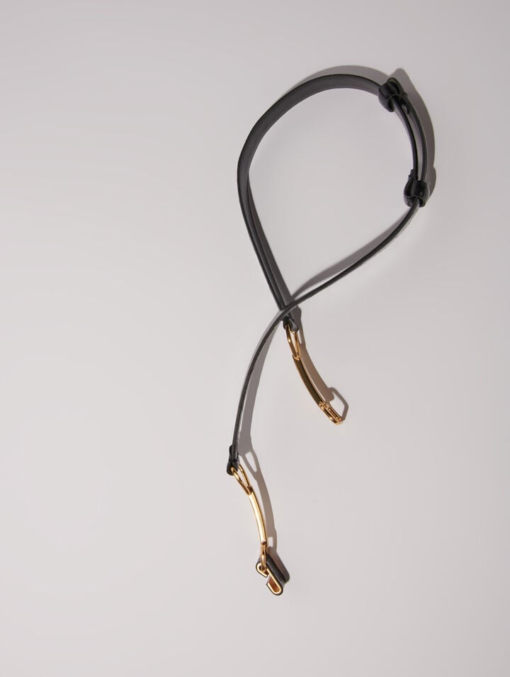 Leather belt with horse bit buckle
