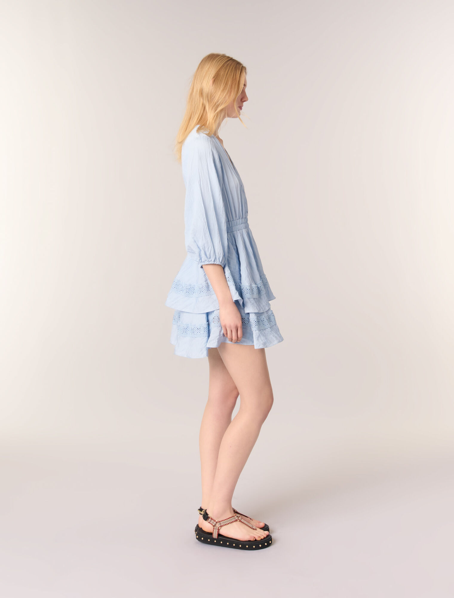 Dress with ruffles and lace details