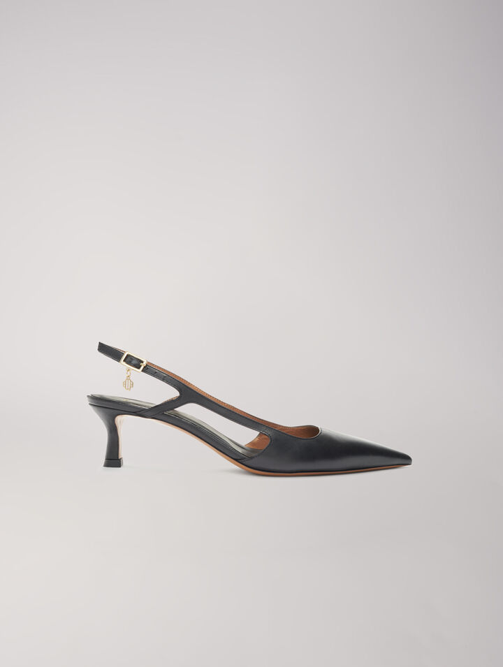 Pointed-toe pumps with straps