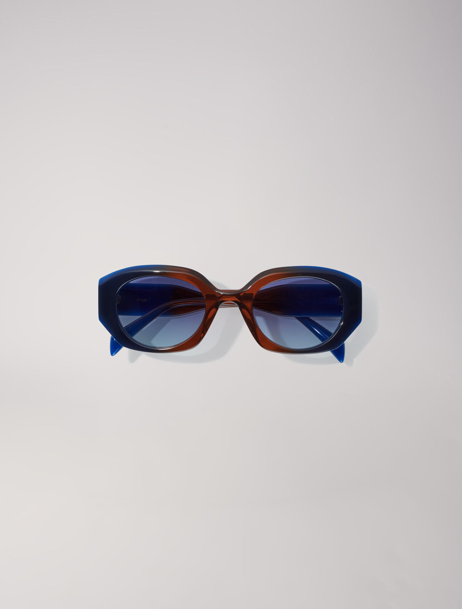 Round acetate glasses
