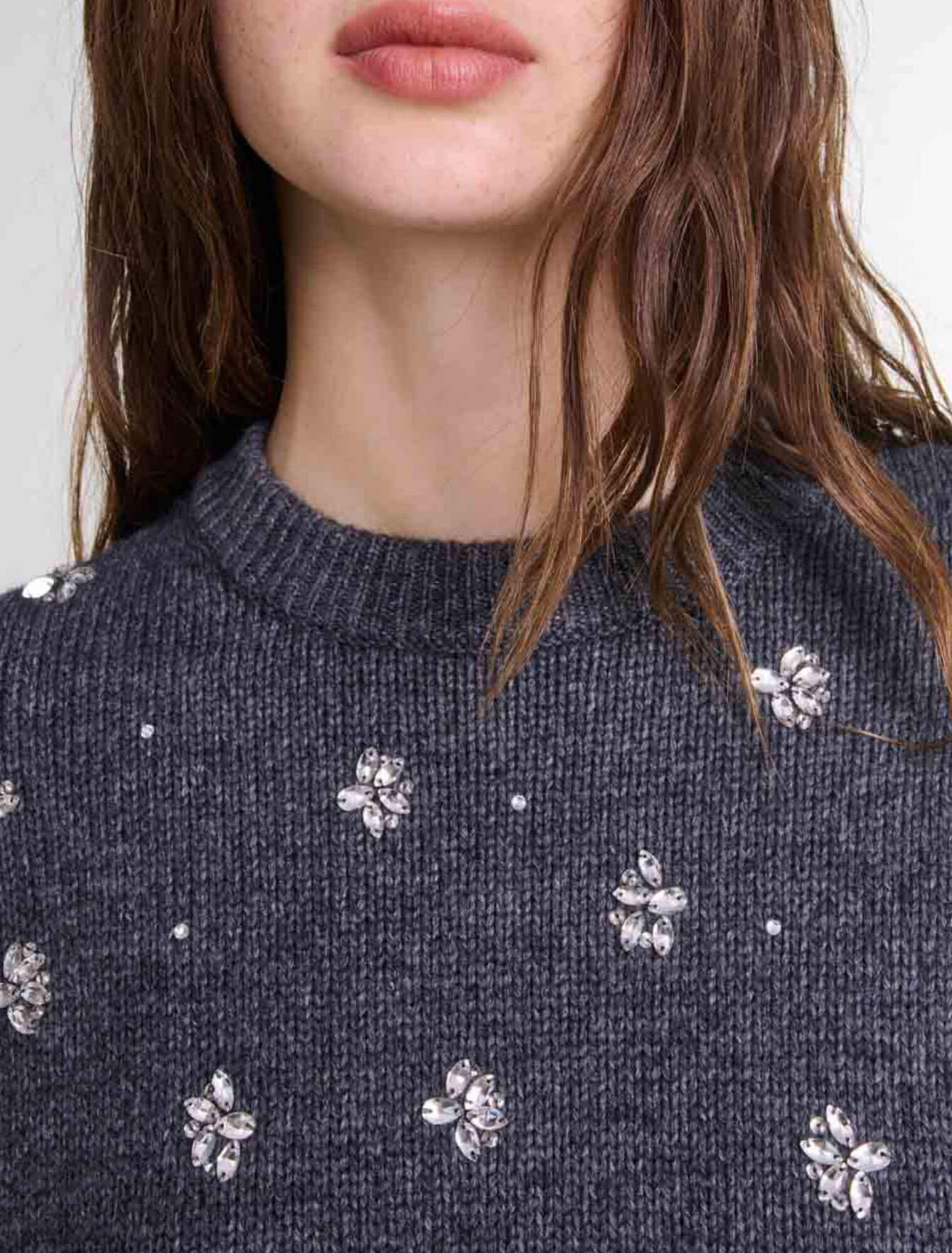 Knitted jumper with rhinestones