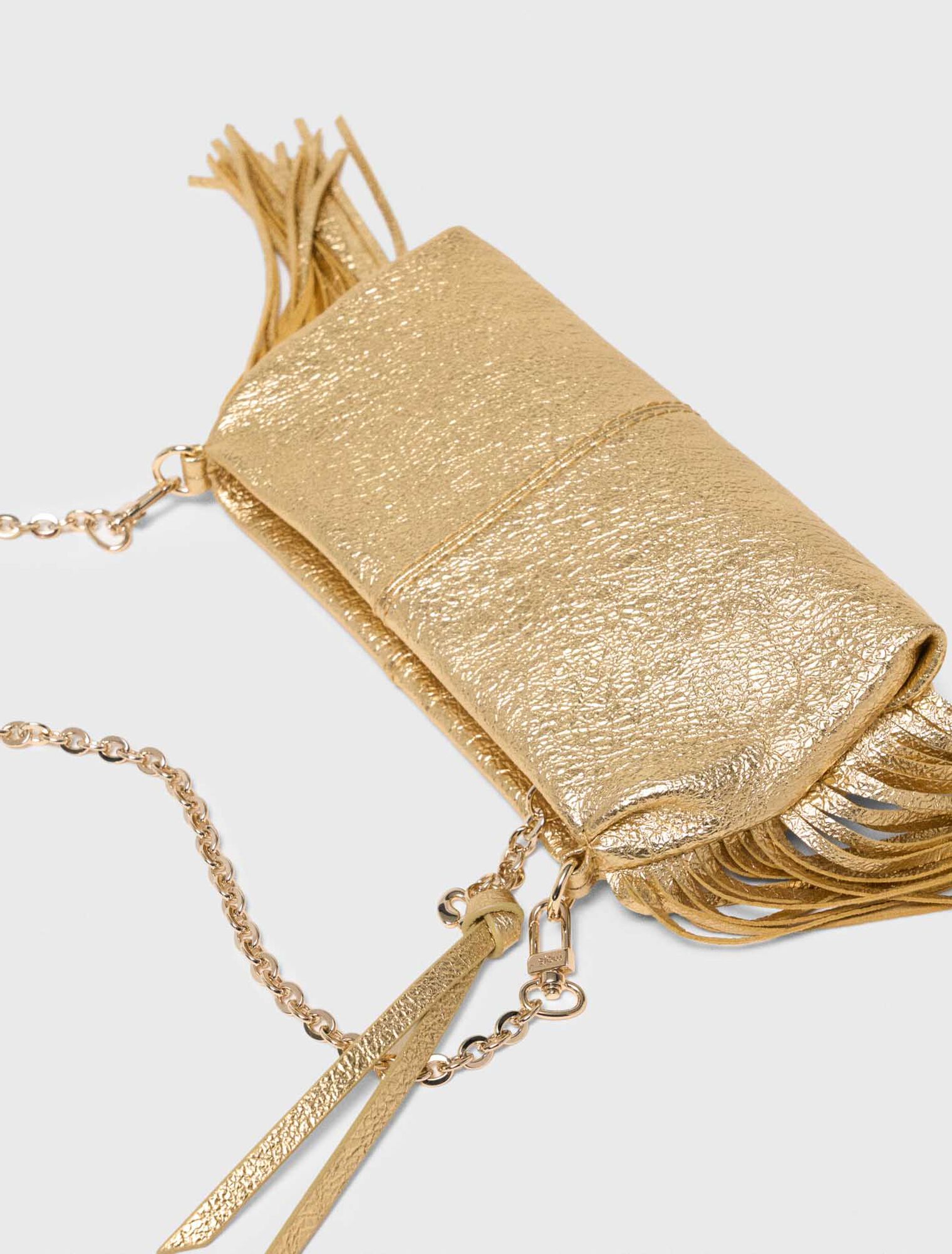 Metallic Miss M clutch bag