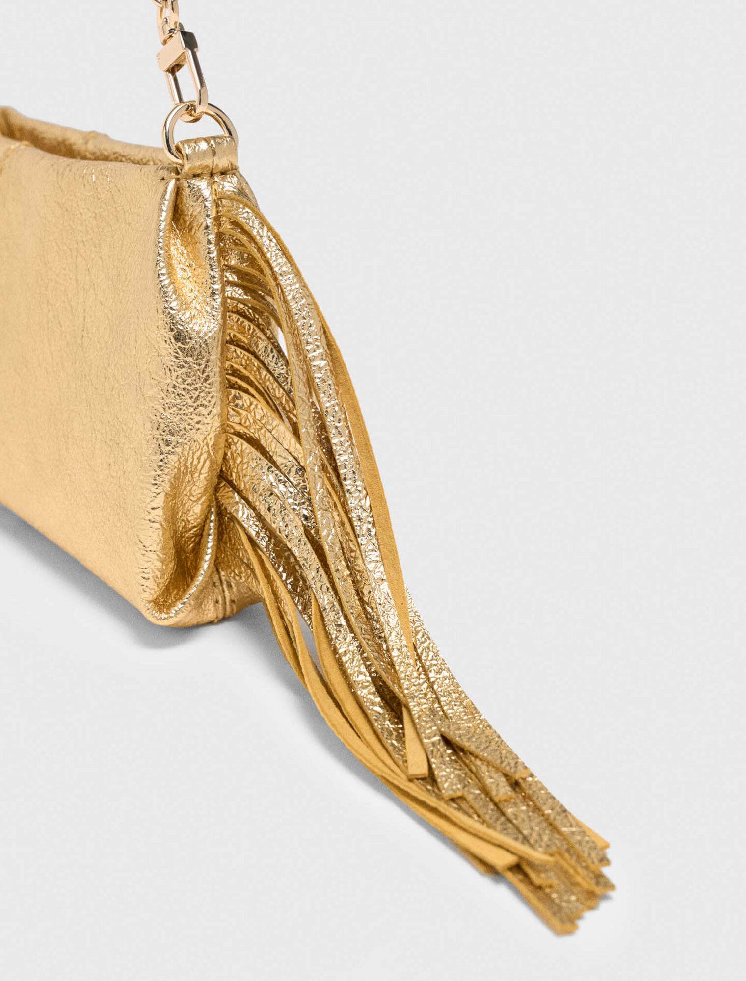 Metallic Miss M clutch bag