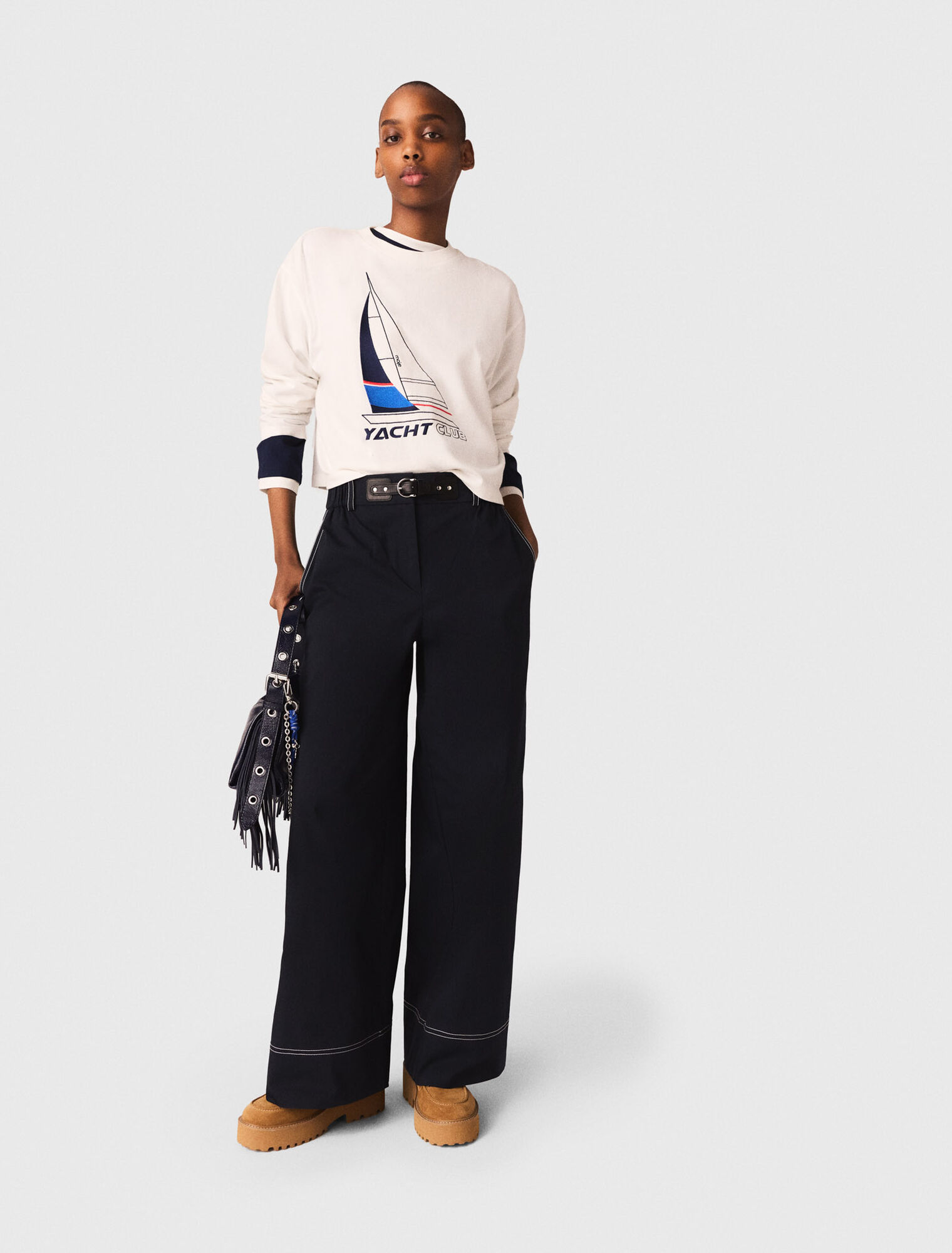 Cotton trousers with leather belt