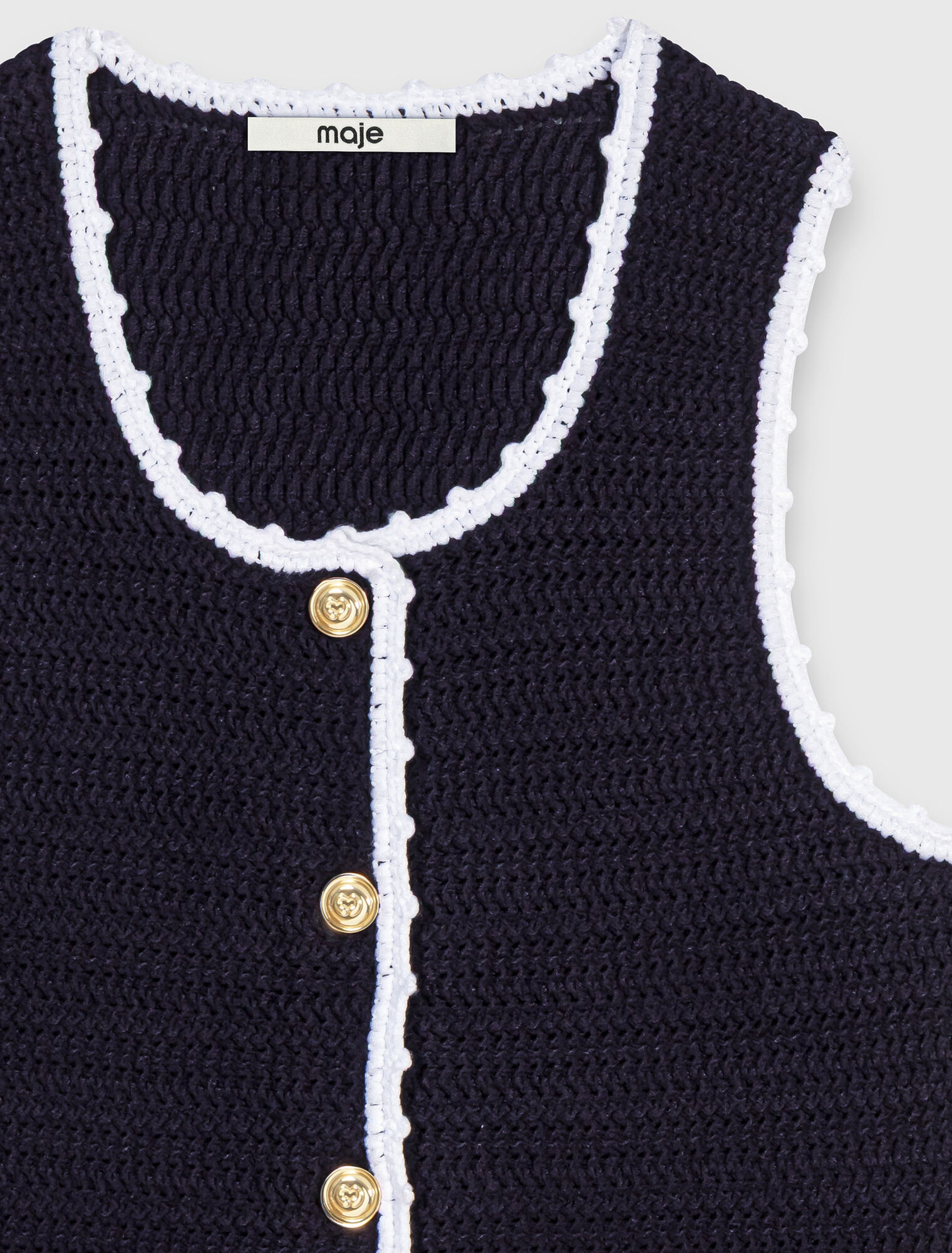 Knit top with crochet trim