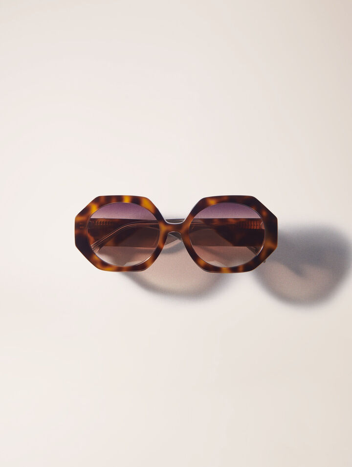 Round acetate glasses