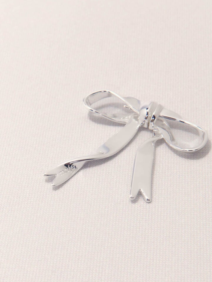 Silver bow earring