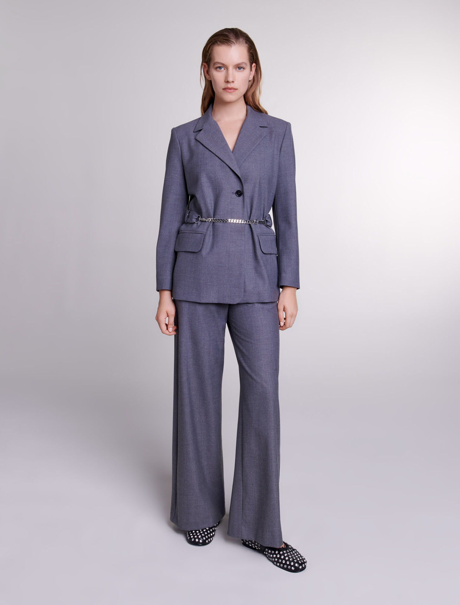 Suit jacket with chain belt