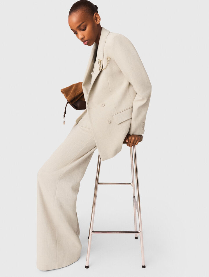 Suit jacket with brooch