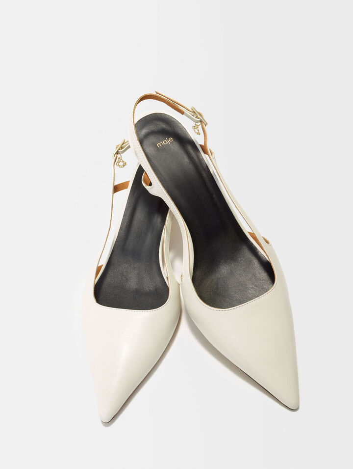 Pointed-toe pumps with straps