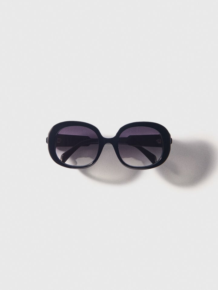 Round acetate glasses